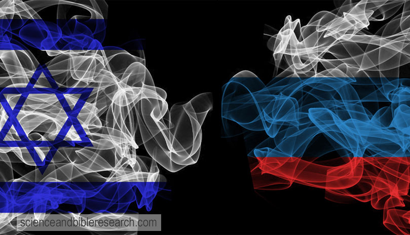 Smoking flags of Israel and Russia on black background (Photo by Allexxandar)